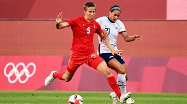Mengenal Quinn, Pesepak Bola Transgender Pertama yang Sabet Emas Olimpiade