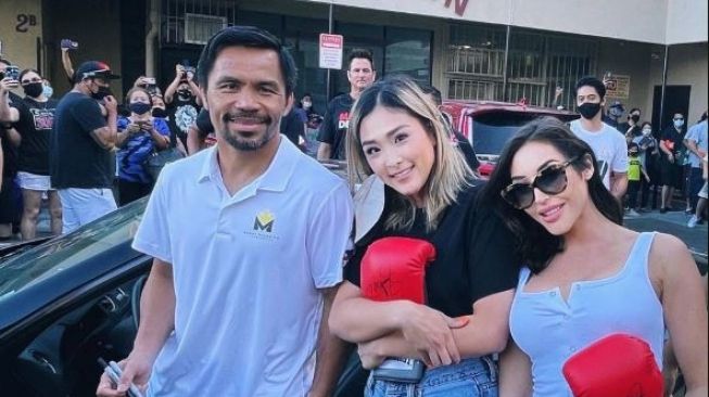 Potret bintang film porno Christiana Cinn bersama Manny Pacquiao. (Instagram/@c_rocket_)