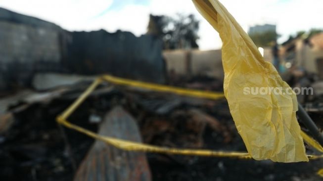 Lokasi kebakaran di Kampung Pemulung, Jalan Kemang Utara IX, Jaksel yang menewaskan satu keluarga. (Suara.com/Fakhri)