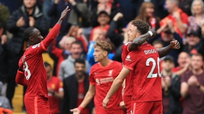 Pemain Liverpool rayakan gol Diogo Jota ke gawang Burnley dalam pertandingan pekan ke-2 Liga Premier Inggris 2021/22 di Anfield, Sabtu (21/8/2021). [AFP]