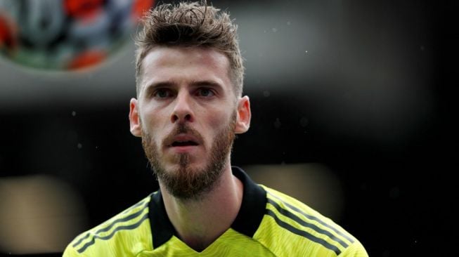 Kiper Manchester United, David de Gea. [ADRIAN DENNIS / AFP]