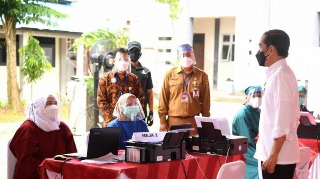 Ditinjau Jokowi, BPJS Kesehatan Pastikan Aplikasi P-Care Vaksinasi Berjalan Lancar