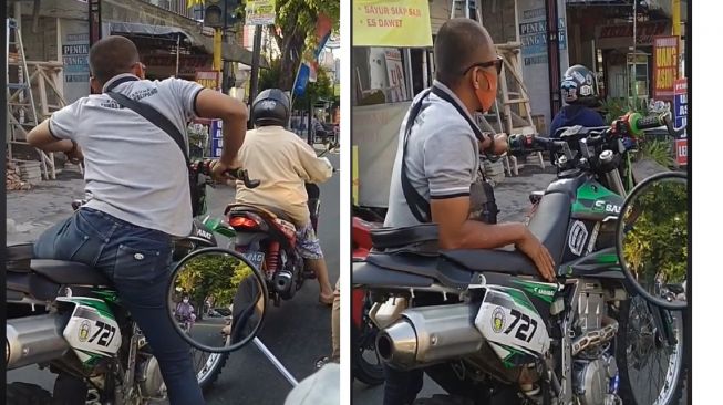 Aksi Pemotor saat Berhenti di Lampu Merah Bikin Ngakak, Motornya Jadi Sorotan