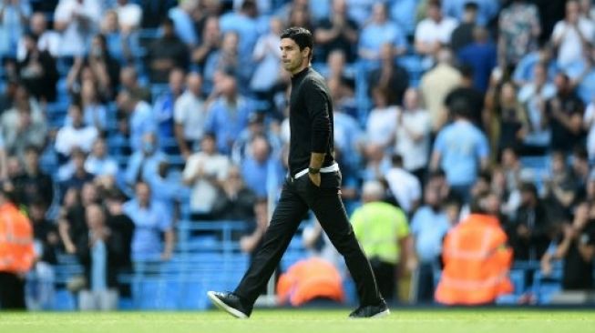 Pelatih Arsenal, Mikel Arteta. (OLI SCARFF / AFP)