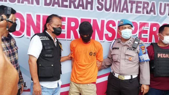 Pelaku pembunuhan ayah dan abang kandung di Medan. [Ist]