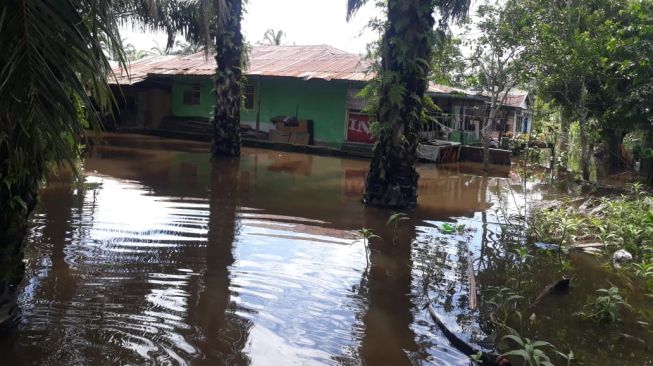 Banjir merendam pemukiman warga di Asahan, Sumatera Utara. [Ist]