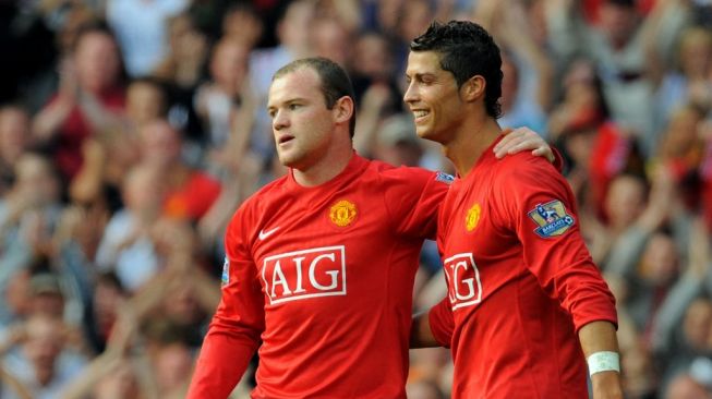 Cristiano Ronaldo (kanan) dan Wayne Rooney saat masih sama-sama berseragam Manchester United. [AFP]