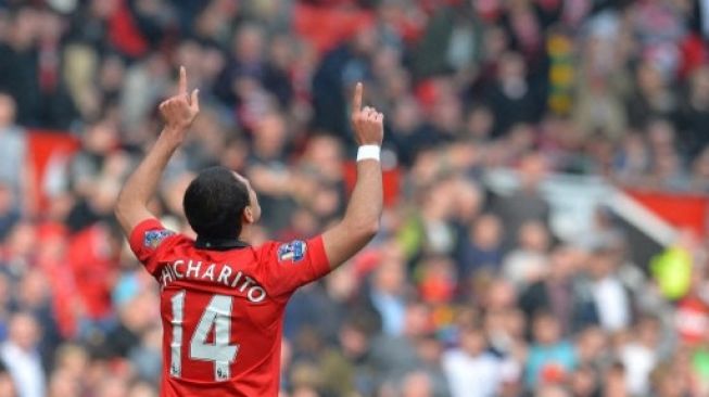 Javier Hernandez or Chicharito, while still in Manchester United uniform, celebrates his goal against Aston Villa in a Premier League match at Old Trafford on March 29, 2014. [AFP]