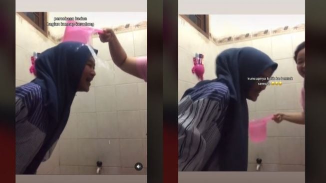 Viral Wanita Uji Coba Kerudung Waterproof (tiktok.com/mukenataraweh)