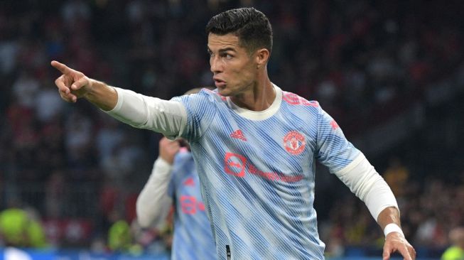 Gestur penyerang Manchester United, Cristiano Ronaldo pada laga Liga Champions kontra Young Boys di Bern, Swiss, Rabu (15/9/2021) dini hari WIB. [SEBASTIEN BOZON / AFP]