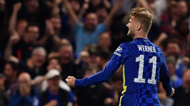 Striker Chelsea Jerman Timo Werner merayakan golnya ke gawang Aston Villa pada pertandingan sepak bola putaran ketiga Piala Liga Inggris di Stamford Bridge di London pada 22 September 2021.Ben STANSALL / AFP