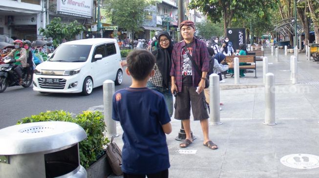 Suasana di kawasan wisata belanja Malioboro, Daerah Istimewah Yogyakarta, Kamis (30/9).  [Suara.com/ Hilal Rauda Fiqry]
