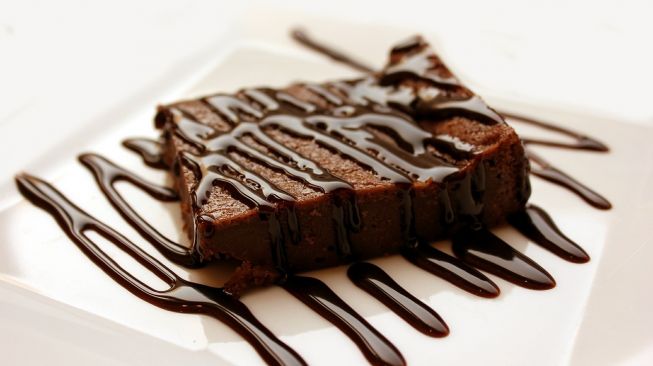 Ilustrasi brownies. (Pixabay/Yiannis Kamatsos)