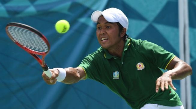 Bungkam Wakil Papua Barat, Rifqi Fitriadi Raih Emas Tenis Tunggal Putra PON Papua