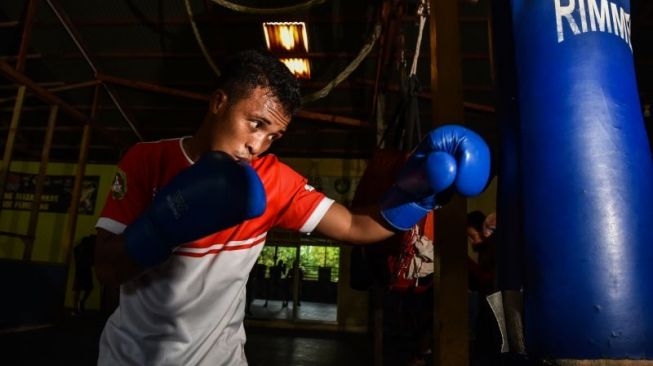 Bungkam Petinju DKI Jakarta, Ingatan Ilahi Gondol Emas Tinju Kelas Terbang PON Papua