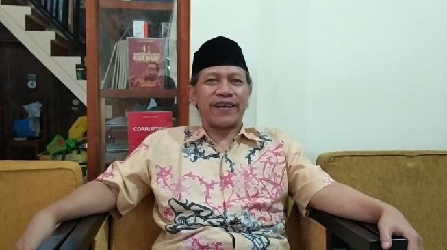 Ketua Pusat Kegiatan Belajar Masyarakat (PKBM) Qaryah Thayyibah Ahmad Bahruddin. [Suara.com/Dafi Yusuf]