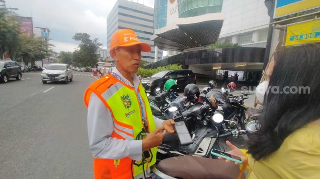 Dishub Medan Ingatkan Jukir E-Parking Tak Terima Retribusi Parkir Tunai, Jika Dilanggar Ini Sanksinya