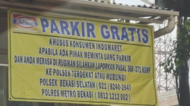 Heboh Spanduk Parkir Gratis di Indomaret, Tuai Perdebatan Sengit