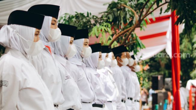 Suasana upacara bendera memperingati hari sumpah pemuda di Banksasuci, Kota Tangerang, Banten, Kamis (28/10) [Suara.com/ Hilal Rauda Fiqry]