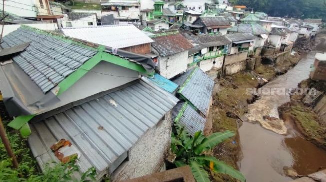 Kentongan Dipasang Sebagai Warning Banjir Warga di DAS Brantas Malang