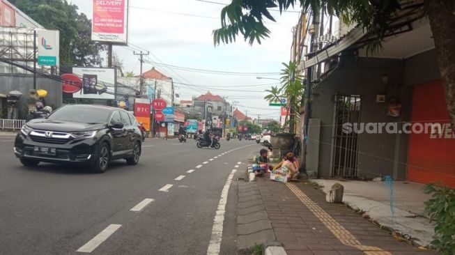 Potret Kelam Kehidupan Anak di Bali, Mengais Rupiah Sebagai Penjaja Tissue di Jalanan