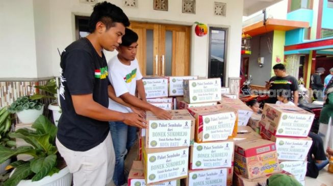 Sisihkan Rivalitas, Bonek Kirim Bantuan untuk Warga Terdampak Banjir Bandang Kota Batu