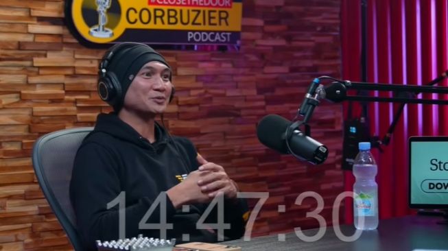 Anji di podcast Deddy Corbuzier. (Youtube/DeddyCorbuzier)