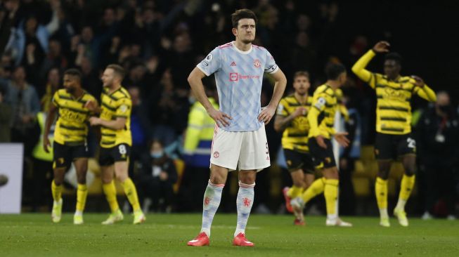 Manchester United Inggris Harry Maguire terdiam selama pertandingan sepak bola Liga Premier Inggris antara Watford dan Manchester United di Stadion Vicarage Road di Watford, Inggris tenggara, pada 20 November 2021.  Ian KINGTON / AFP