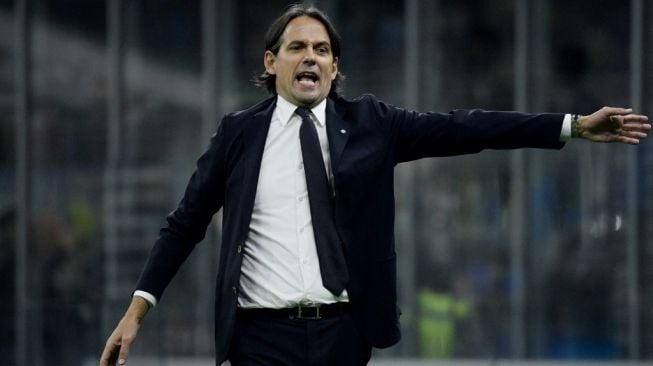 Pelatih Inter Milan, Simone Inzaghi. [Filippo MONTEFORTE / AFP]