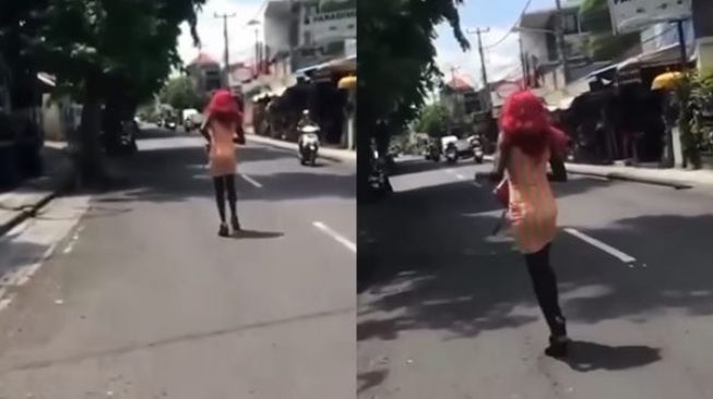 Viral WNA Berjalan di Tengah Jalan Raya Bak Model Catwalk, Picu Kemacetan