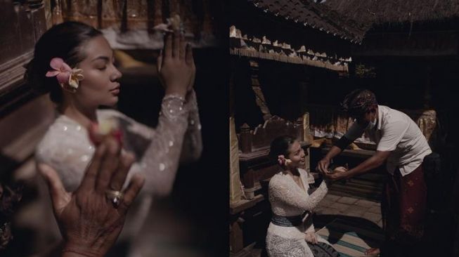 Ariel Tatum unggah foto jalani ritual di Bali. (Instagram/@arieltatum)