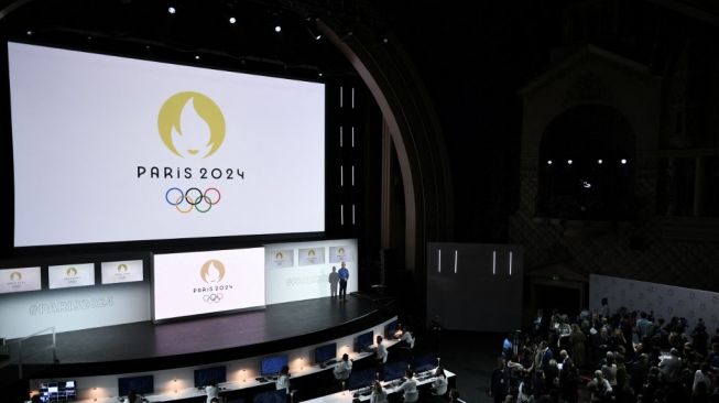 Orang-orang menghadiri upacara presentasi logo untuk Olimpiade Paris 2024 di bioskop Grand Rex di Paris pada 21 Oktober 2019.STEPHANE DE SAKUTIN / AFP.