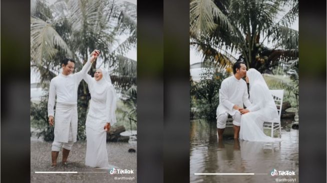 Pengantin Lakukan Foto Pernikahan di Tengah Banjir (tiktok.com/@ariffrosly1)