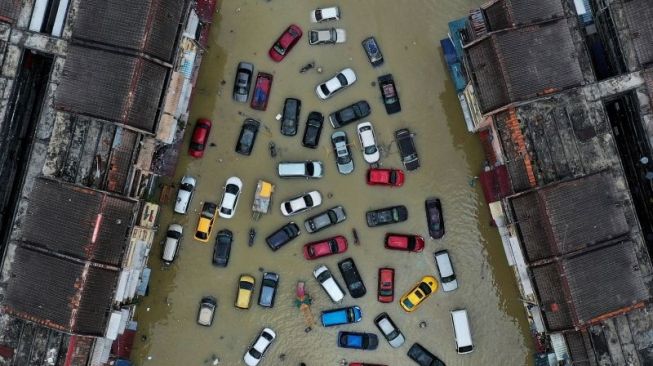 Banjir Besar di Malaysia Sebabkan Kerugian Triliunan