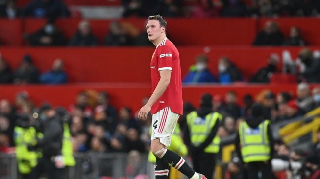 Bek Manchester United asal Inggris, Phil Jones tampil dalam laga pekan ke-21 Liga Inggris antara Manchester United vs Wolves di Old Trafford di Manchester, Selasa (4/1/2022) dini hari WIB.Paul ELLIS / AFP.