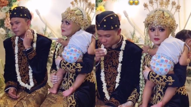 Pengantin Momong Keponakan saat Resepsi, Warganet Malah Salfok: Mirip Lesti Kejora