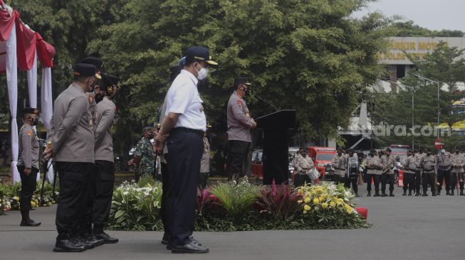 Kapolri Jenderal Listyo Sigit Prabowo memberikan sambutan saat upacara peresmian tim Perintis Presisi Polda Metro Jaya di Lapangan Presisi Polda Metro Jaya, Jakarta, Kamis (13/1/2022). [Suara.com/Angga Budhiyanto]