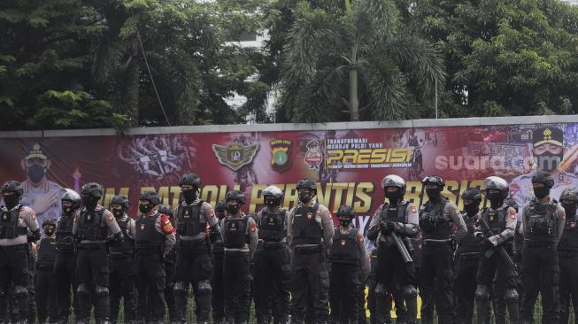 Anggota polisi mengikuti upacara peresmian tim Perintis Presisi Polda Metro Jaya di Lapangan Presisi Polda Metro Jaya, Jakarta, Kamis (13/1/2022). [Suara.com/Angga Budhiyanto]