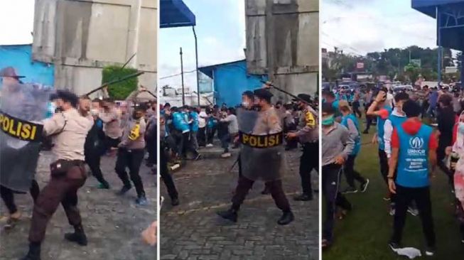 Tangkapan layar polisi menghalau massa demo pengungsi Afghanistan di Pekanbaru. [Twitter/Veronica Koman]