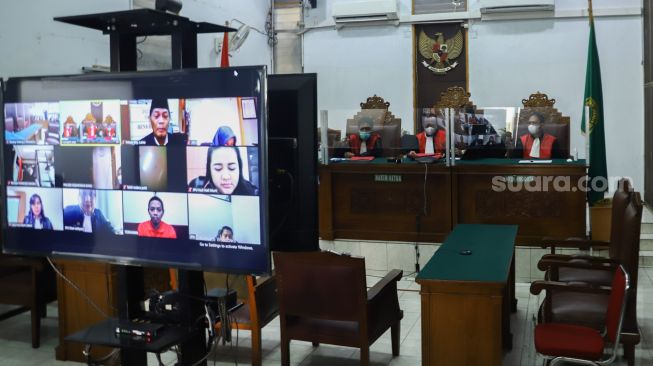 Suasana jalaannya sidang kasus penipuan CPNS yang melibatkan Olivia Nathania di Pengadilan Negeri Jakarta selatan, Rabu (26/1/2022). [Suara.com/Alfian Winanto]