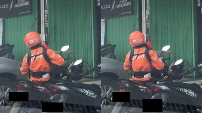 Viral Driver Ojol Kerja Sambil Gendong Anak, Warganet Nangis: Ayah Terbaik