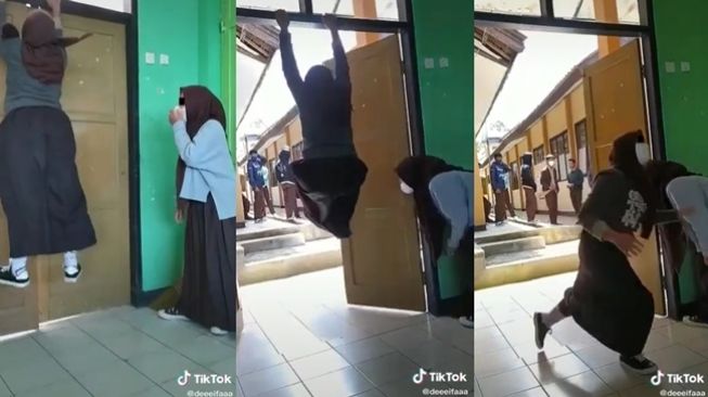 Siswi lari menahan malu aksinya memanjat pintu kelas ditonton teman laki-laki. (TikTok/@deeeifaaa)