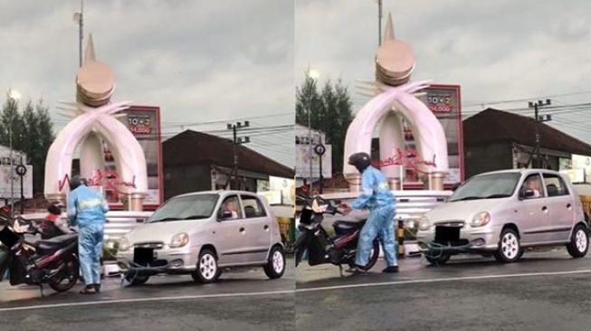 Viral Pria Tarik Mobil Mogok Pakai Motor, Warganet Angkat Topi: Supra Wani Ngeyel!