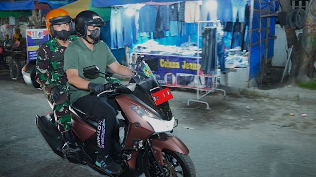 Aksi Wali Kota Medan Bobby Nasution Naik Motor Malam Hari, Bergerak ke Marelan Temui Warga