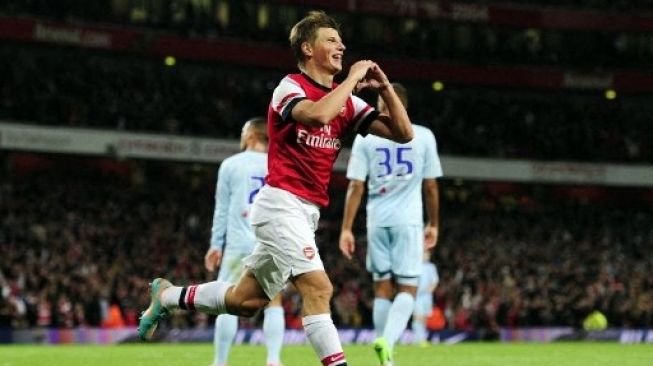 Pemain Arsenal Andrey Arshavin rayakan gol ke gawang Coventry dalam pertandingan Piala Liga Inggris pada 26 September 2012 di Emirates Stadium. [AFP]