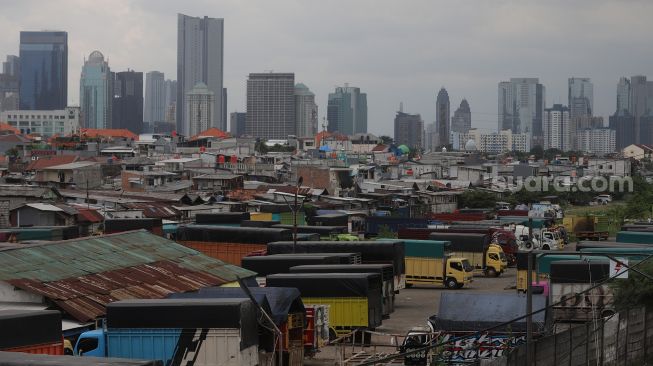 Suasana permukiman padat penduduk di kawasan Tanah Abang, Jakarta, Sabtu (26/2/2022). [Suara.com/Angga Budhiyanto]