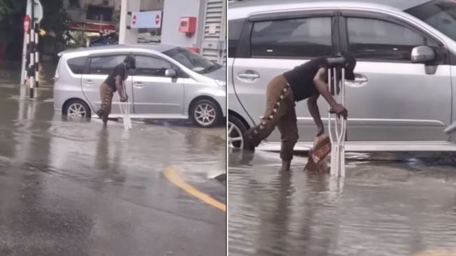 Hati Warganet Tertampar, Meski dalam Kondisi Kekurangan, Pria Ini Masih Bantu Bersihkan Sampah di Tengah Banjir