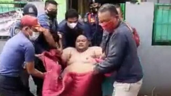 Seorang warga Pabuaran, Kecamatan Cibinong, Kabupaten Bogor yang memiliki berat badan 180 kilogram [Bogordaily]