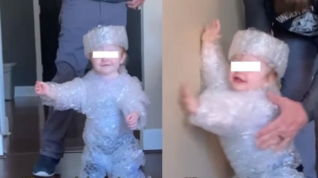 Biar Tahan Banting, Seorang Ayah 'Melindungi ' Anak dengan Membungkusnya Pakai Bubble Wrap