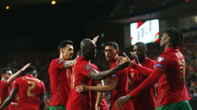 Pemain Portugal merayakan gol Matheus Nunes dalam pertandingan play-off Kualifikasi Piala Dunia 2022 lawan Turki pada 25 Maret 2022. ANTARA/REUTERS/PEDRO NUNES.